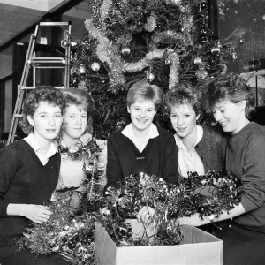 Rawthorpe High School pupils decorating the Christmas Tree in the entrance to St Luke Rawthorpe High School pupils decorating the Christmas Tree in the entrance to St Luke