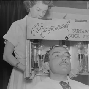 Raymond, hair stylist, has poodle cut'DM 9 / 3 / 1951 Staff