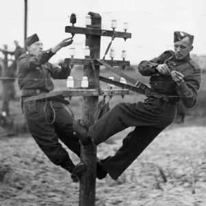 RCS men in training. Erecting outside telegraphic communications and wiring RCS men in training. Erecting outside telegraphic communications and wiring