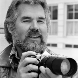 Recording star Kenny Rogers, a keen amateur photographer, pictured in London