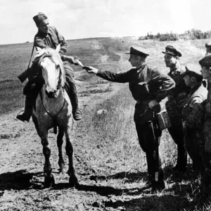 Red Army dispatch rider on the Western Front. A Red Army man delivers a dispatch to his Red Army dispatch rider on the Western Front. A Red Army man delivers a dispatch to his