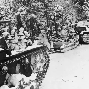 Red Army ski troops on their way to advanced lines, riding on sledges and tanks