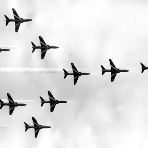 The Red Arrows acrobatic team sweep through at the Recro