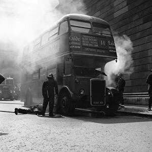Red Double Decker Bus on Fire - May 1959 firemen attempt to tackle the fire