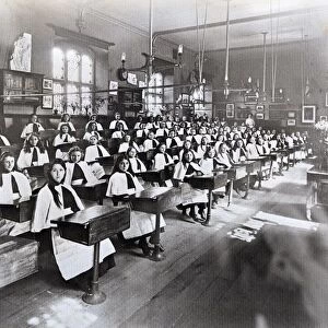 Red Maids in their distinctive outfits in the old school in Denmark Street Bristol Circa