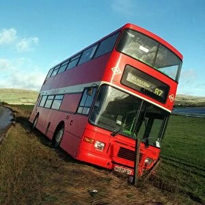 A red number 87 bus which was blown off the road at Kirkintilloch en route to Glasgow