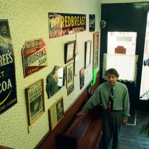 Redcar barber Mike Forbes with some of his collection of memorabilia in his shop Redcar barber Mike Forbes with some of his collection of memorabilia in his shop