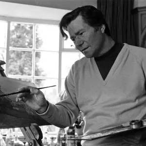 Reg Varney, actor and painter, touches up his latest work, at home in Enfield Reg Varney, actor and painter, touches up his latest work, at home in Enfield