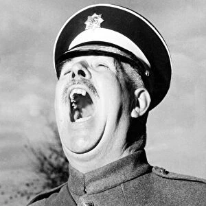 Regimental Sergeant Major Brittain shouting instructions Circa 1955