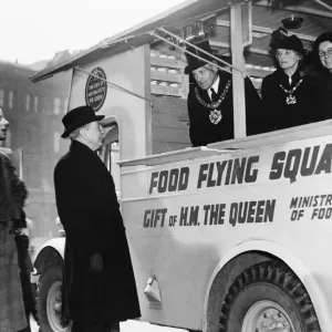 Regional Commissioner Harry Haig inspects a mobile canteen during the Second World War
