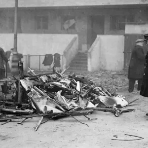 The remains of a bus, destroyed in Stepney, East London following an air raid by