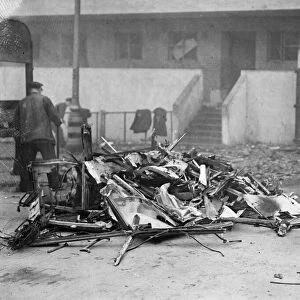 The remains of a bus, destroyed in Stepney, East London following an air raid by