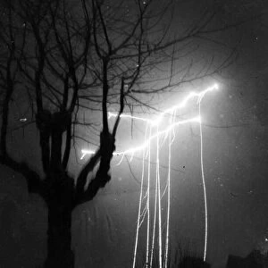 Remarkable picture of parachute flares dropped in London. 29th December 1940