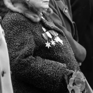Remembrance Sunday in Rhyl, Denbighshire, Wales. Betty Hughes ready to lay her Remembrance Sunday in Rhyl, Denbighshire, Wales. Betty Hughes ready to lay her