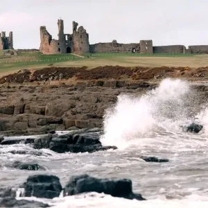 The remote and impressive ruins of Northumberlands Dunstanburgh Castle in July 1996