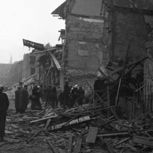 Rescue workers search the collapsed buildings of the Central London Ophthalmic Hospital Rescue workers search the collapsed buildings of the Central London Ophthalmic Hospital