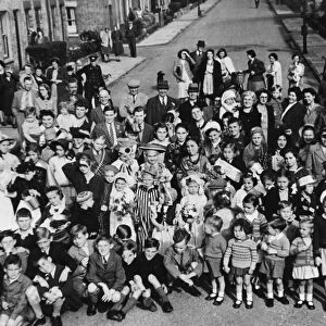 Residents of Beche Road, Cambridge pose during street party celebrations
