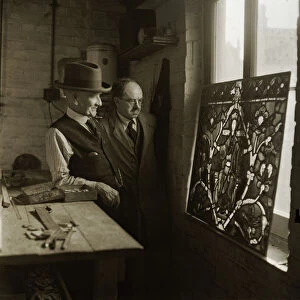 Restoring the blitzed stained glass window of Canterbury Cathedral is Mr Caldwell aged 92