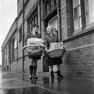 Black and white photograph Print of two women leaving a wash house