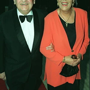 Retired comedian Ronnie Barker and his wife arrive at the Bafta awards ceremony
