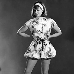 Reveille fashions 1962: Annie Alliston wearing a floral print beach wear outfit
