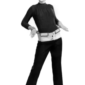 Reveille Fashions 1966: Delia Freeman modelling trouser suit. November 1966 P006594