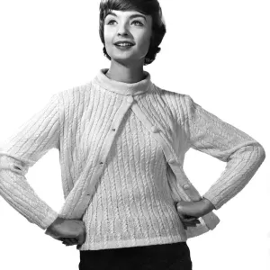 Reveille Fashions: Cable set. Cardigan over matching jumper. February 1961 P006859 Reveille Fashions: Cable set. Cardigan over matching jumper. February 1961 P006859