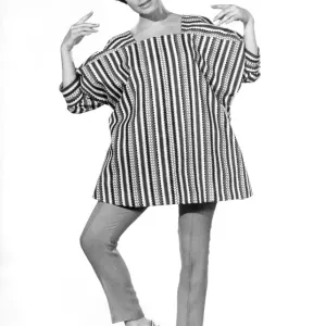 Reveille Fashions: Carol Chilves modelling smock top. August 1967 P006706