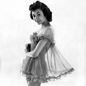Reveille Fashions: Julia Shearing. May 1958 P025274
