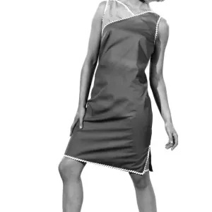 Reveille Fashions: Marilyn Rickard modelling sleeveless summer dress. August 1966 P006617