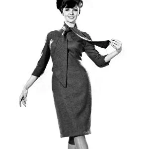 Reveille Fashions: Meriel Weston modeling a business dress with pencil style skirt