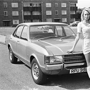 Reveille model Andrea Lloyd seen here posing with a Ford Consul which is top prize in