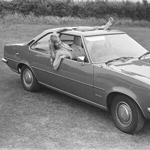 Reveille model Angela Jay seen here posing with a Opel Kadett car first prize in a