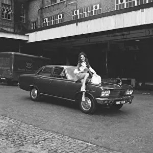 Reveille model Beulah Hughes seen here posing with a Vauxhall Cresta which is top prize