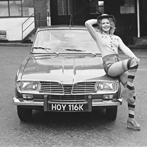 Reveille model Jenny Wilson seen here posing with a Renault car which is top prize in