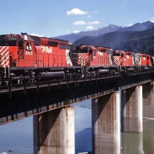 Revelstoke British Columbia Canada Freight train pulled by four diesel engines