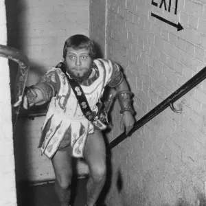 Richard Attenborough wearing Greek costume running up stairs backstage at the Piccadilly Richard Attenborough wearing Greek costume running up stairs backstage at the Piccadilly