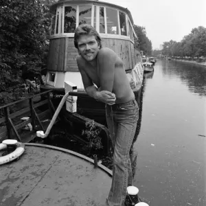 Richard Branson aboard his houseboat / office at Maida Vale, London. 31st July 1982 Richard Branson aboard his houseboat / office at Maida Vale, London. 31st July 1982