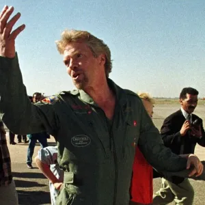 Richard Branson British tycoon gestures as he arrives at a Moroccan airbase after