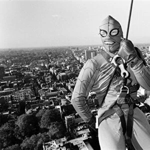 Richard Branson dressed as spiderman leaves the top of Centre Point. 2nd November 1985