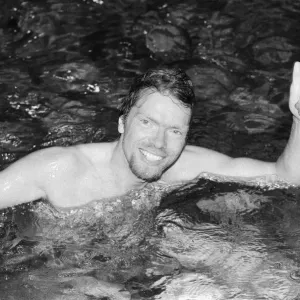 Richard Branson pictured thumbs up and celebrating with relief after being rescued