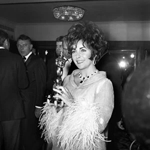 Richard Burton and Elizabeth Taylor seen here at the British Film Awards where Mrs