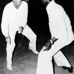 Richard Burton on the floor in Tshipisei at a birhday party in Oct 1977 Richard Burton on the floor in Tshipisei at a birhday party in Oct 1977