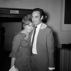 Richard Johnson at London Airport meeting his wife Kim Novak on her return to this Richard Johnson at London Airport meeting his wife Kim Novak on her return to this