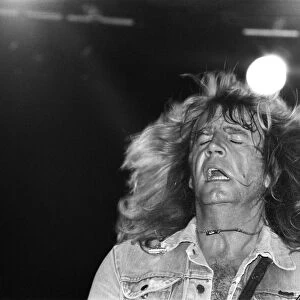 Rick Parfitt of rock group Status Quo, in concert in Vienna, Austria. 8th May 1986