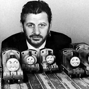 Ring Starr of the Beatles pictured here with Thomas the Tank Engine Toys