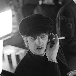Ringo Starr of the Beatles pop group, pictured smoking a cigarette after the band leaft