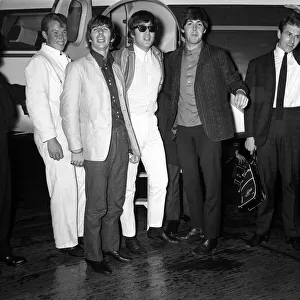 Ringo Starr, John Lennon and Paul McCartney of The Beatles pictured at Blackpool Airport