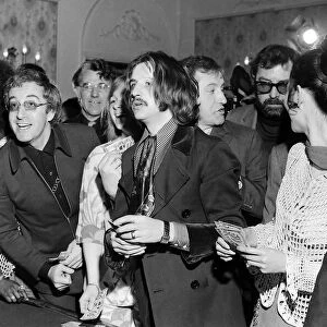 Ringo Starr with Peter Sellers play roulette at Les Ambassadeurs club party after