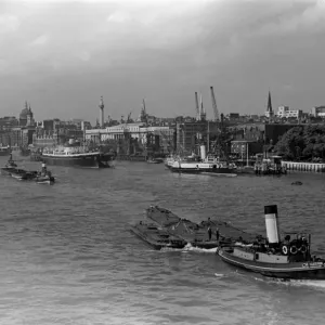 The River Thames and the pool of London seen from the road deck of Tower Bridge
